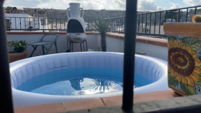 Отель Apartment with terraces and private Jacuzzi - San Vito 400m from beach, Сан Вито Ло Капо